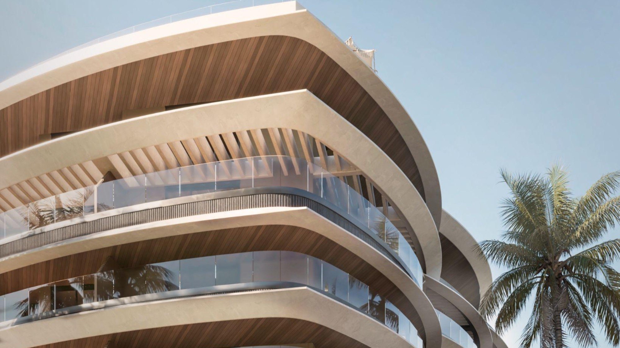 Rendering of the upper floors of Puerto Marina against a clear sky: one curved low-rise building of 97 residences at Marina Cap Cana, due for delivery in 2029.