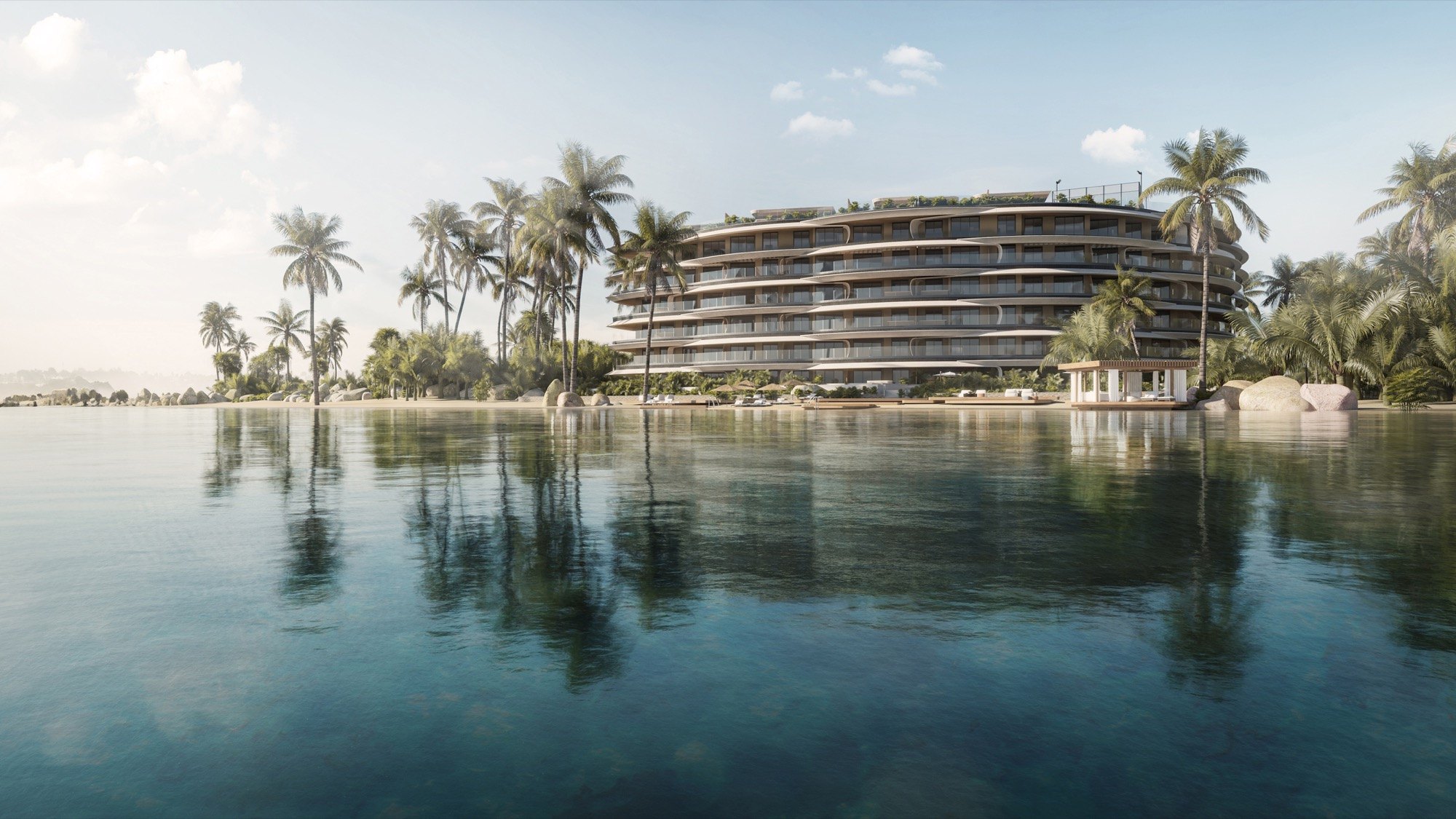 Rendering of Puerto Marina seen from across the lake where residents have a private beach, in a development set 660 ft from the sea at Marina Cap Cana.